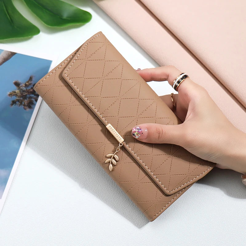 2024 summer new Korean version of high texture PU Diamond lattice personality leaf pendant three fold bag multi-card can be expa
