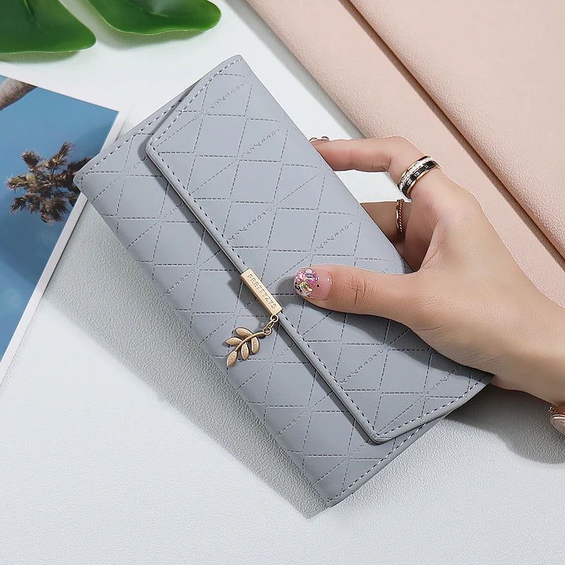 2024 summer new Korean version of high texture PU Diamond lattice personality leaf pendant three fold bag multi-card can be expa