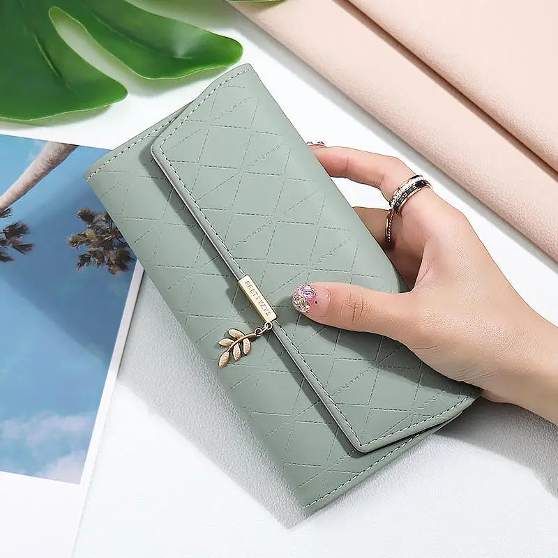 2024 summer new Korean version of high texture PU Diamond lattice personality leaf pendant three fold bag multi-card can be expa